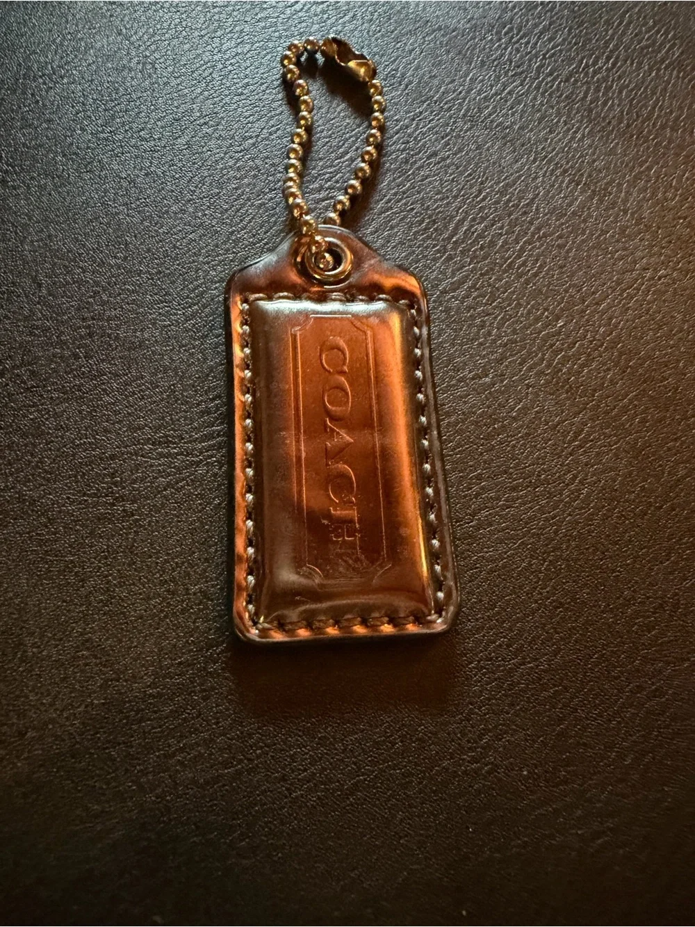 Coach Metallic Mauve Purple Leather Tag Keychain with Gold Chain